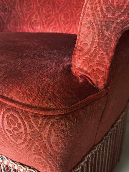 Le fauteuil crapaud rouge - bordeaux à franges
