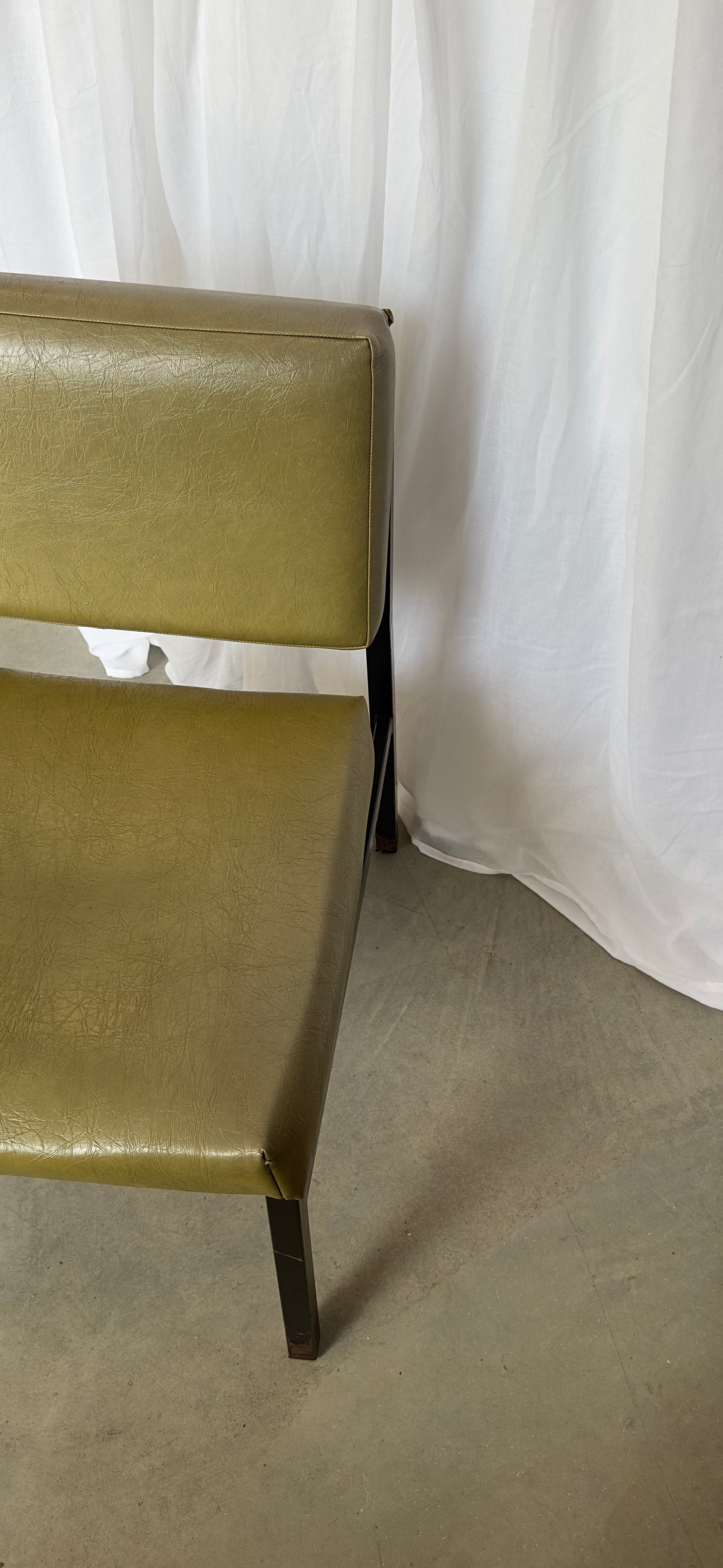 Le fauteuil olive des années 70