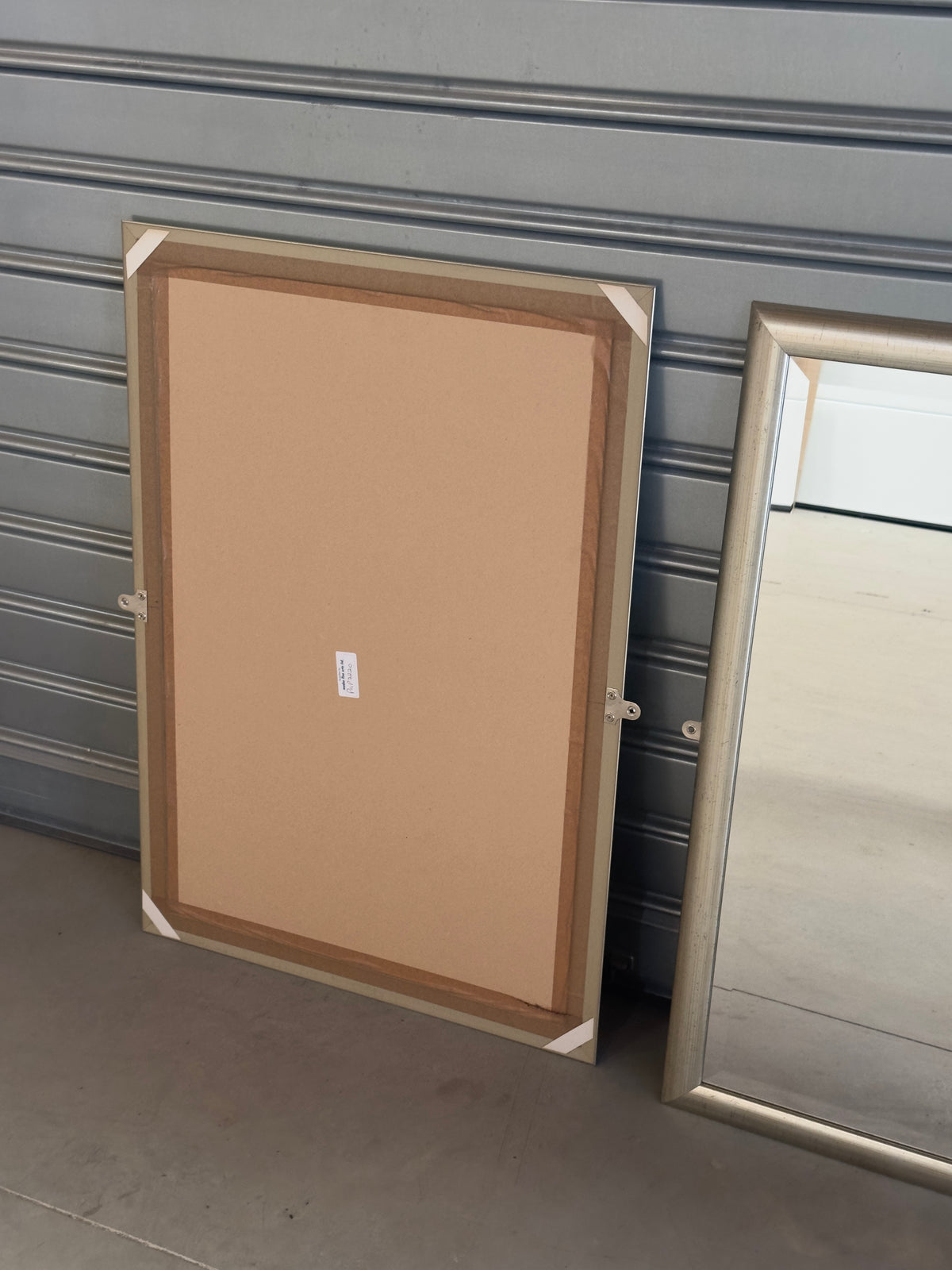 Paire de miroirs biseautés finition or blanc vieilli (prix unitaire)